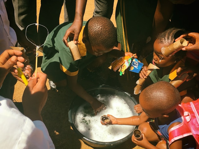 students washing hands to avoid diseases in school